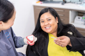 Rawson Dental patient with Invisalign Treatment from Dr. Tracy Le